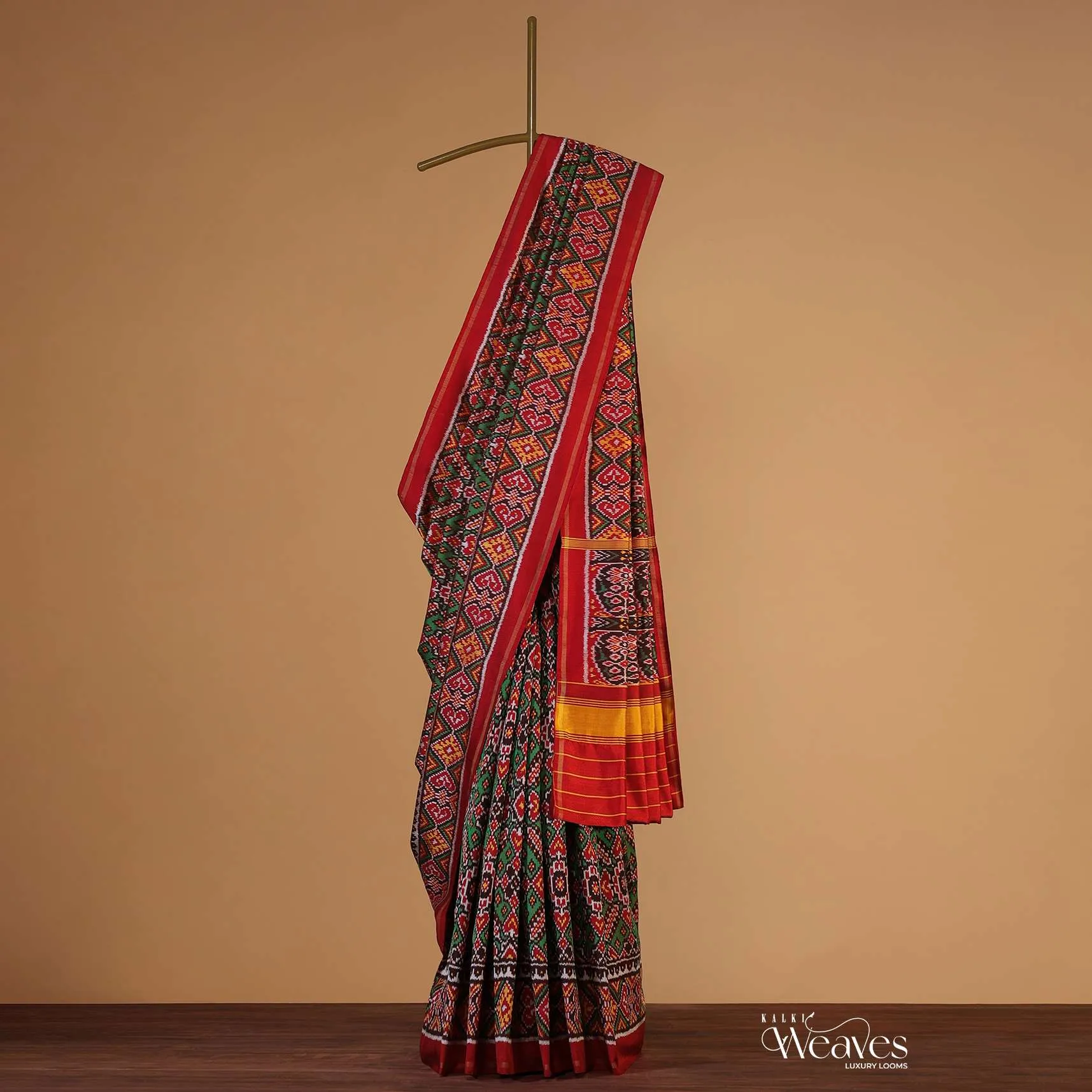 Fern Green Handloom Double Ikat Patola Woven Saree In Linen With An Unstitched Blouse