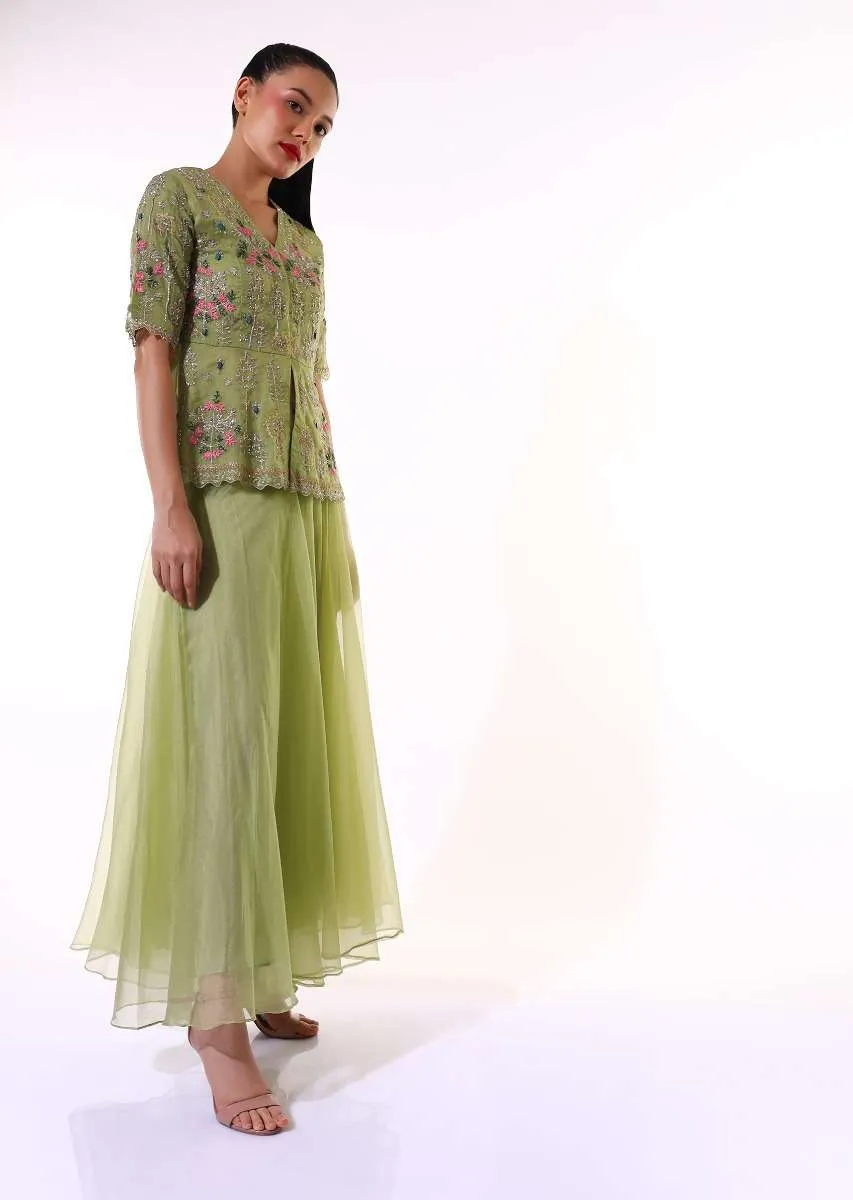 Green Palazzo Suit In Organza With A Matching Peplum Top Adorned In Zari And Thread Embroidery